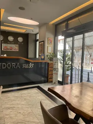 a restaurant with a table and chairs in a room at Pandora Hotel in Istanbul