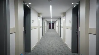 a corridor of an office building with a hallway at Kervansaray Bursa City Hotel in Bursa