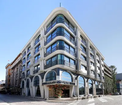 a large white building on a city street at Golden Horn Bosphorus Hotel in Istanbul