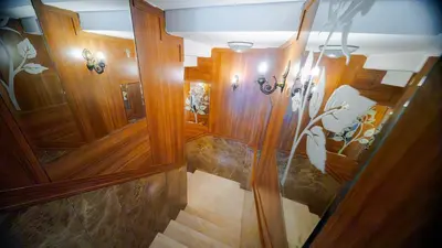 an overhead view of a hallway with wood walls and stairs at Sahil Boutique Hotel in Istanbul