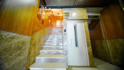 a staircase in a building with a white door at Sahil Boutique Hotel in Istanbul