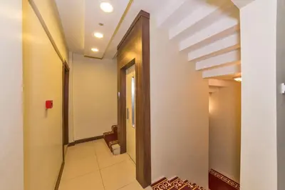 a hallway with a door in a building at Sahil Boutique Hotel in Istanbul