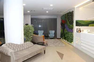 a living room with a couch and chairs at Elegance Resort Hotel & SPA Wellness-Aqua in Yalova