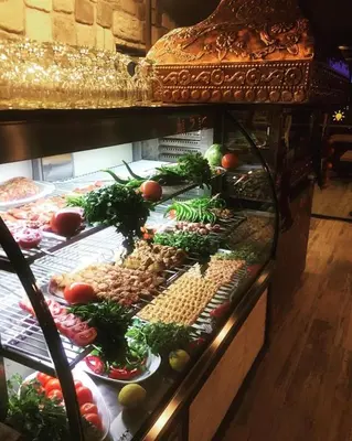 a display case with many different types of vegetables at RİVADA HOTEL in Kartepe