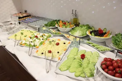 a buffet with different types of food on a table at Hotel Osaka Airport in Istanbul