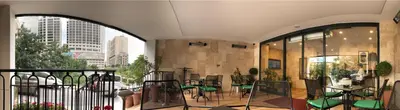 a room with tables and chairs in a building at The White Orient Hotel in Istanbul