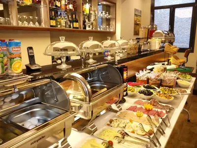 a buffet line with many different types of food at The White Orient Hotel in Istanbul
