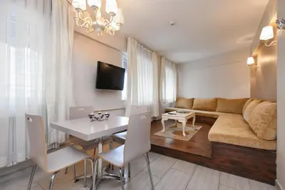 a living room with a couch and a table at Résidence Le Rêve in Istanbul