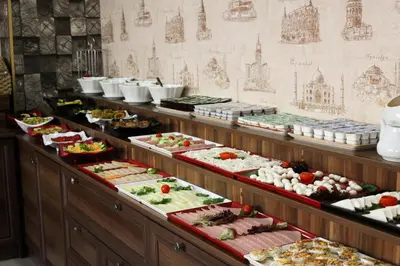 a buffet line with many different types of food at Ayasultan Hotel in Istanbul