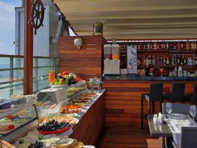 a buffet line with food on display in a restaurant at Burckin Hotel in Istanbul