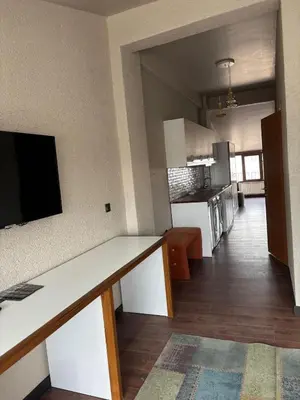 a kitchen with a white counter top in a room at Mezzo Hotel in Istanbul