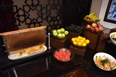 a buffet of fruits and vegetables on a table at Neorion Hotel - Special Class in Istanbul
