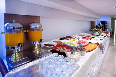 a buffet line with many different foods and drinks at Merdan Hotel in Istanbul