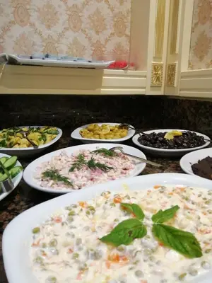 a bunch of plates of food on a table at Nayla Palace Hotel-Special Category in Istanbul
