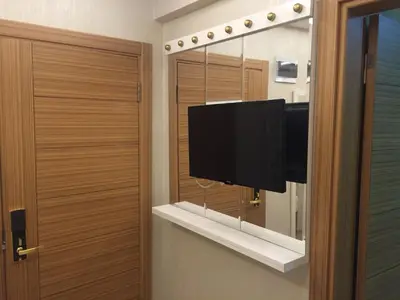 a television on a shelf in a room at ARINÇ HOTEL in Istanbul