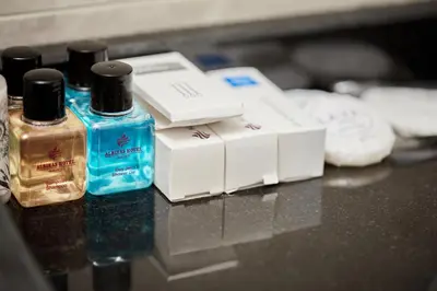 a counter with two bottles of soap on it at Albinas Hotel Old City in Istanbul