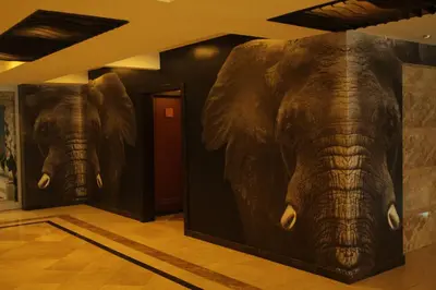 a mural of an elephant on the wall of a room at Arya Hotel Sakarya in Sakarya