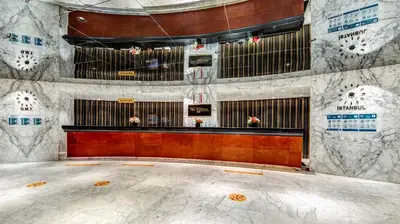 an empty room with a bar in a building at The Elysium Taksim in Istanbul