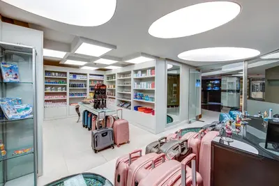 a store with several pink suitcases in a room at The Elysium Taksim in Istanbul