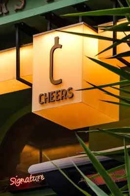 a sign for the cheetos restaurant at Cheers Porthouse in Istanbul