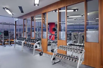 a gym on the floor of a skyscraper at Hilton Bursa Convention Center & Spa in Bursa