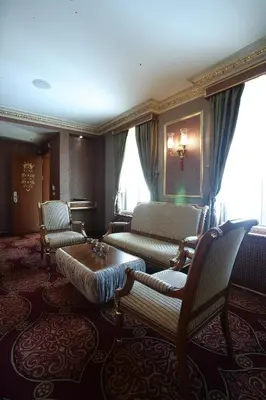 a living room with chairs and a couch and a table at Fuat Pasa Oteli - Special Category Bosphorus in Istanbul