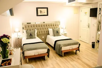 a bedroom with two beds in a room at Primero Hotel in Istanbul