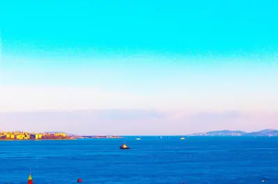 a large body of water with a boat in it at Charm Hotel in Istanbul