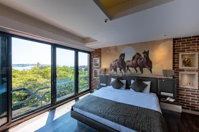 a bedroom with a mural of horses on the wall at Riva's Moda in Istanbul