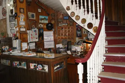 a room with a staircase and a counter and a stair case at Yeşilköy Airport Hotel in Istanbul
