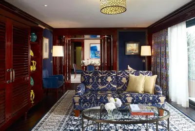 a living room with a couch and a table at Divan Istanbul in Istanbul