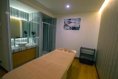 a hospital room with a bed and a sink at Innova Sultanahmet Istanbul in Istanbul