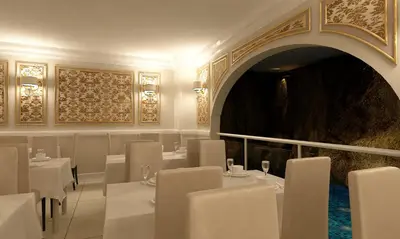 a dining room with white tables and chairs at Grand Eyuboglu Hotel in Istanbul