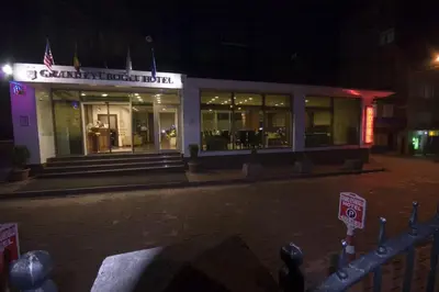 a store front of a building at night at Grand Eyuboglu Hotel in Istanbul