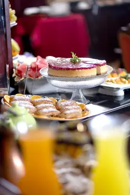 a buffet of food with pies and cakes and drinks at Balin Hotel - Special Category in Istanbul