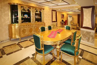 a dining room with a wooden table and chairs at Balin Hotel - Special Category in Istanbul