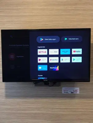 a flat screen tv sitting on top of a table at Endless Comfort Hotel Taksim in Istanbul