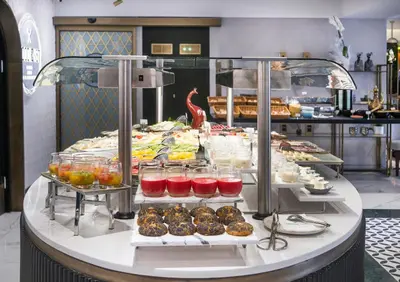 a buffet line with many different types of food at Vogue Hotel Supreme Istanbul in Istanbul