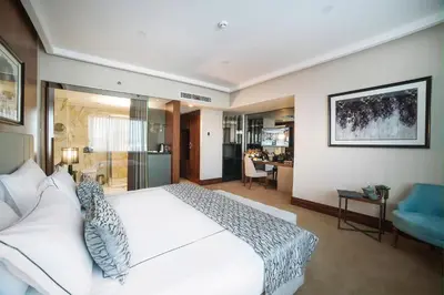 a bedroom with a large white bed in a room at Vogue Hotel Supreme Istanbul in Istanbul