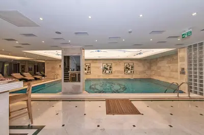 a large swimming pool in a hotel room at Piya Sport Hotel in Istanbul