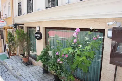 a store with flowers on the side of a building at Artika Hotel in Istanbul