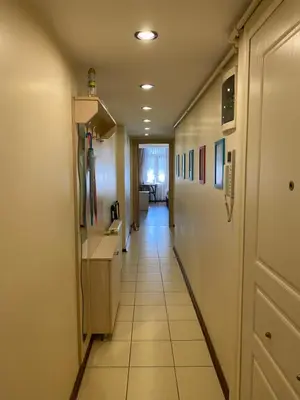 a hallway of a hospital with a long corridor at Taksim House Suites in Istanbul