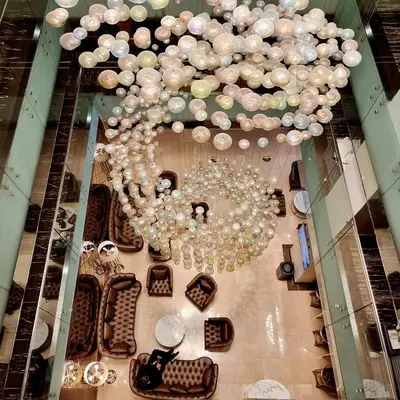 a large chandelier hanging from the ceiling in a store at Port Bosphorus Hotel in Istanbul