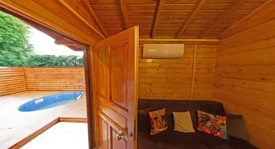 an inside view of a sauna with a tub at Alfa Suites & SPA in Sapanca