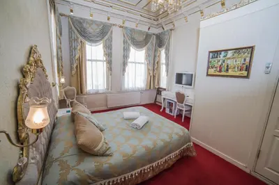 a bedroom with a bed in a room at HHK Hotel in Istanbul