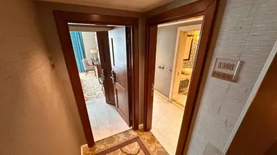an empty hallway with a door and a room with a hallway at Grand Durmaz Hotel in Istanbul