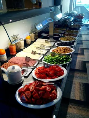 a buffet line with many different types of food at Kardes Hotel in Bursa