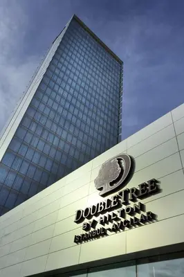 a building with a sign on the side of it at DoubleTree by Hilton Istanbul-Avcilar in Istanbul