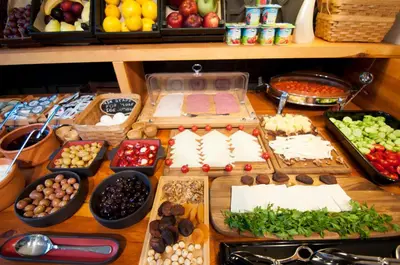 a table with many different types of food on it at Nomade Hotel Exclusive in Istanbul