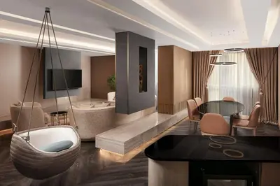 a living room with a couch and a table at Sheraton Istanbul City Center in Istanbul